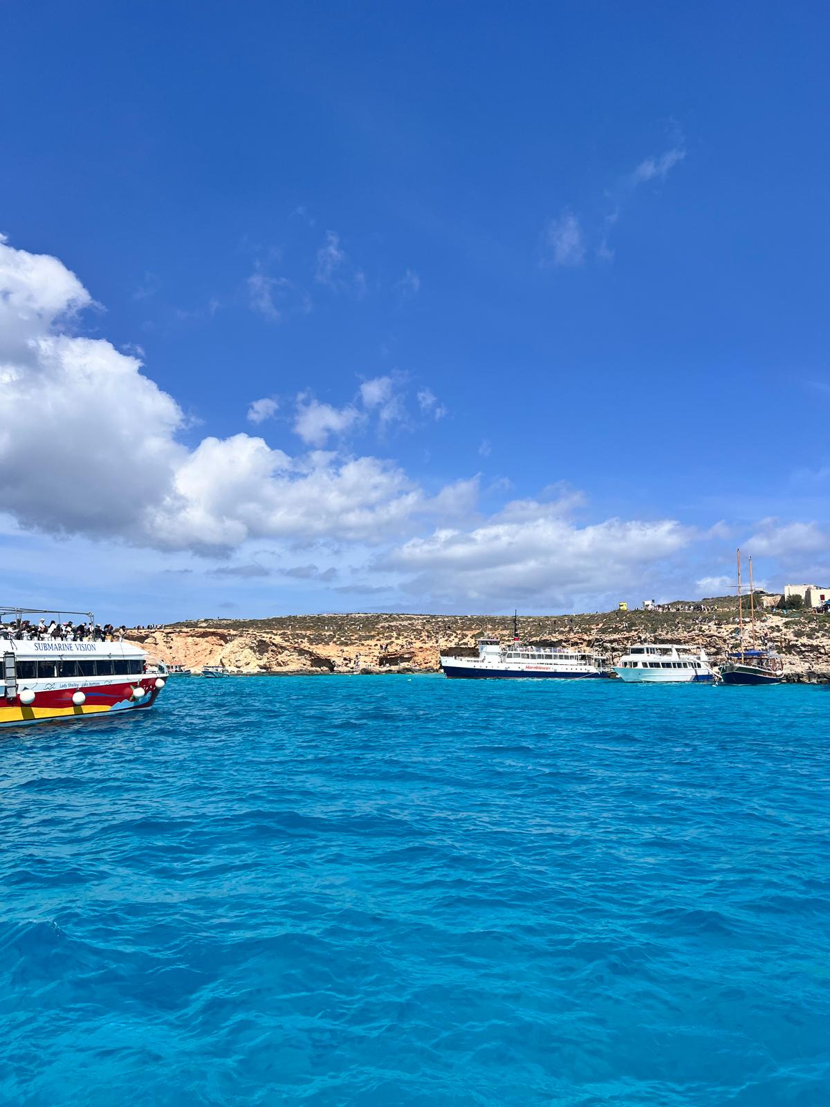 Swimming break at the Blue Lagoon during an ideal day in Malta, with turquoise water and perfect sunshine